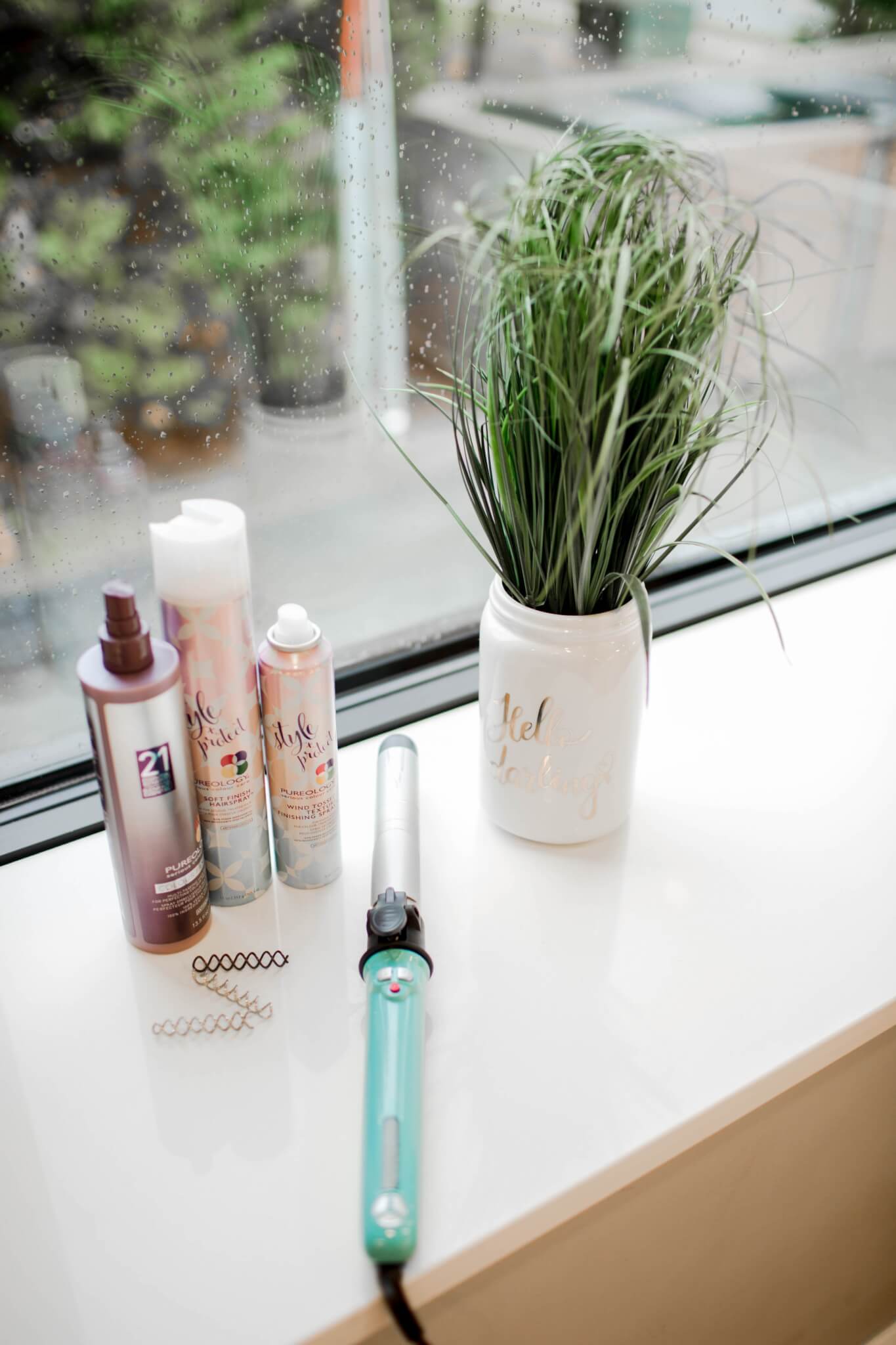 Curly Hair 1. Prep hair. We used Pureology Hair Color Fanatic Leave-in-Conditioner and Pureology Soft Finish Hairspray (yes we used it before curling to help lock the curls in place later). 2. Take sections of hair to curl. To make things easier, separate the sides from the back section. When curling the side sections, curl them away from the face. When curling the back, you can alternate the directions you are curling to give a bit of texture and not just one uniform direction of curls. 3. Run fingers through hair. This finishes off the look. Spray hairspray for hold power. Tip: You may also vary the
